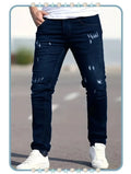 Jean Azul Oscuro con Detalles Rasgados de Hombre